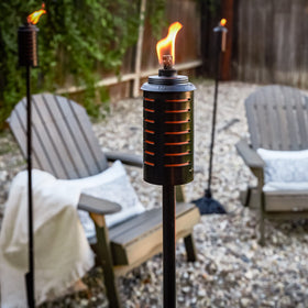 TIKI metal black orange torch mid-size 49-inch mode for versatile garden lighting.