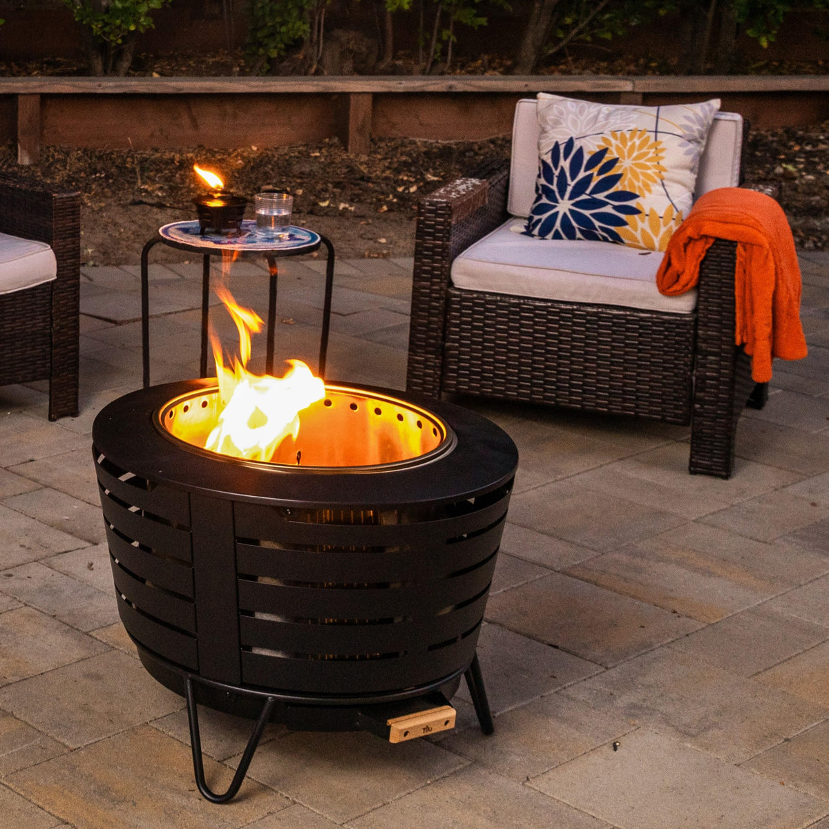 TIKI Mini Pit Table Torch portable design for easy patio to garden use.