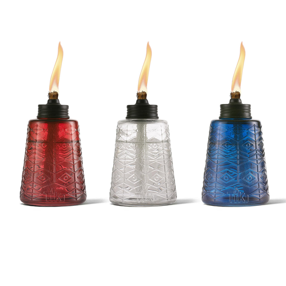 TIKI molded glass tabletop torches set of three brighten outdoor dining.