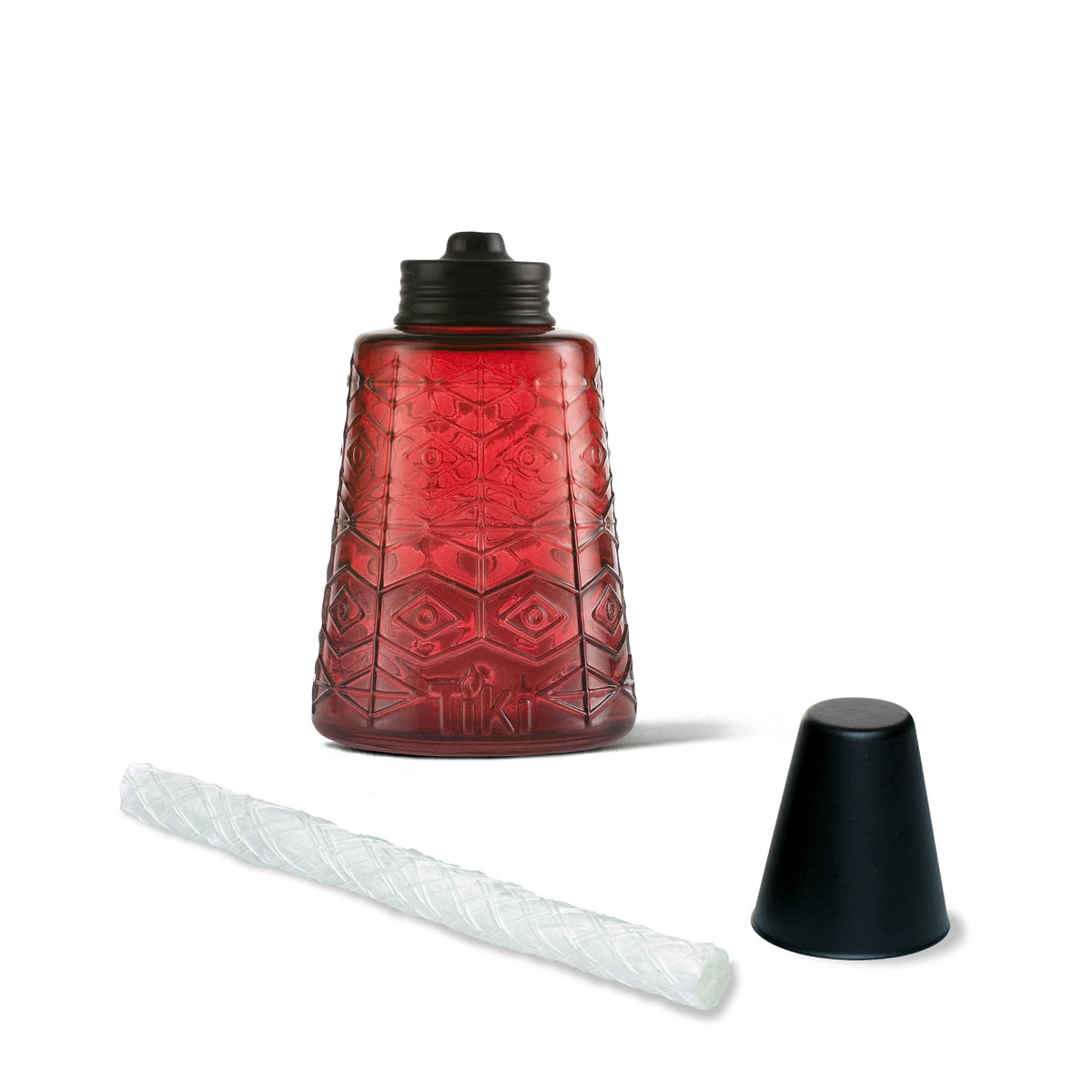 Three colorful torches on a table create inviting backyard ambiance.