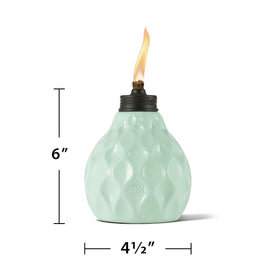 TIKI Seaside Escape table torch in coral pink glass ideal for warm sunset dining