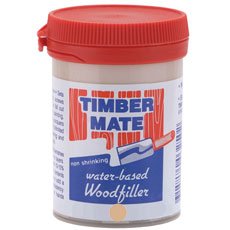 Timbermate Red Oak wood filler 8oz in use on wood surface for seamless blending.