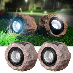 Timeflies Solar Rock Lights outdoor 2-pack illuminate garden paths at dusk.
