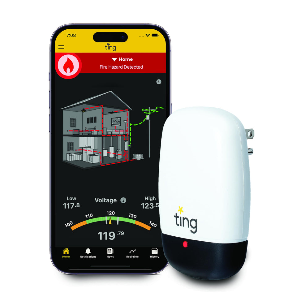 Ting Fire sensor mounted beside an outlet for real time home safety monitoring.