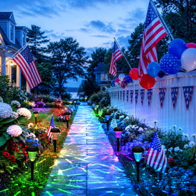 TISEJOY solar pathway lights patio garden border provide warm ambient lighting after sunset.