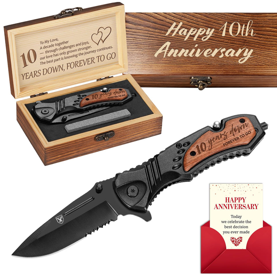 Titorld 10-year anniversary pocket knife beside a gift box for a keepsake.
