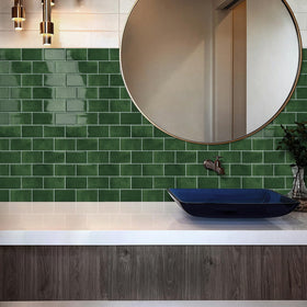 Tiwoos green peel-stick backsplash 12x12 sheet pack on display.