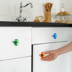 Tkocisa crystal pulls add colorful sparkle to bookcase or cupboard