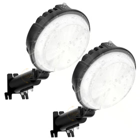 Toberich LED barn light 2-pack in dusk-to-dawn mode illuminating the yard.