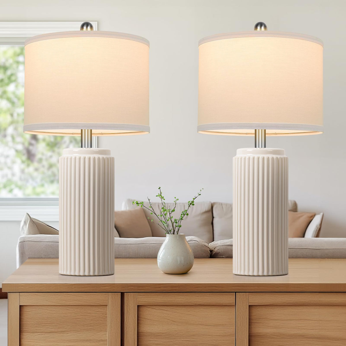 TOBUSA ceramic table lamp pair – base view highlighting cream finish and vertical stripe.