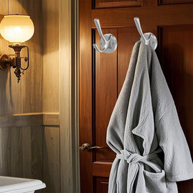 TOFIIGREM brushed nickel hook used for towels in bathroom.