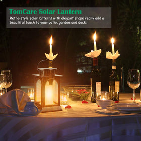TomCare outdoor lanterns illuminate a porch with warm solar light