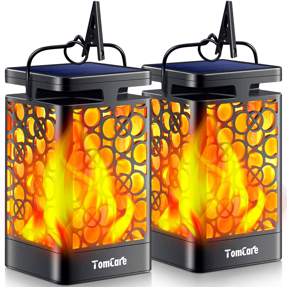 TomCare solar lantern close-up with flickering flame design for cozy outdoor evenings.