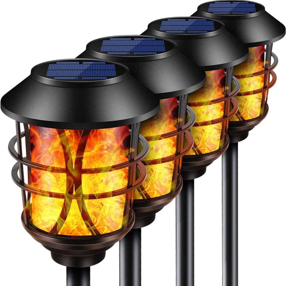 TomCare solar torch flame garden lights illuminate walkways with warm glow.