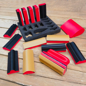Tonmp baseboard and molding sanding tool for precise finishing and detailing.