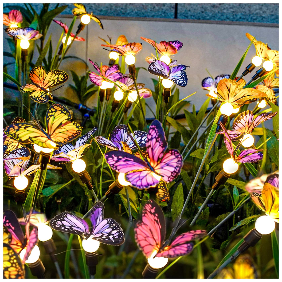 TONULAX solar butterfly lights sway in the wind, creating a dynamic garden focal point.