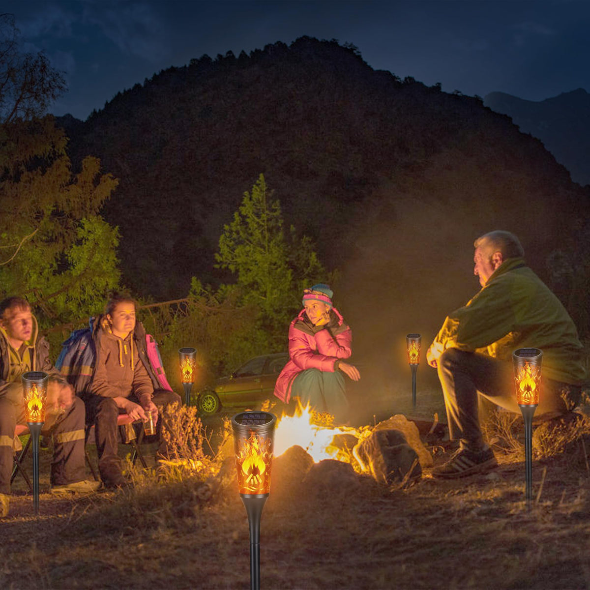 Toodour lighting creates party-ready ambiance with flickering flames outdoors.