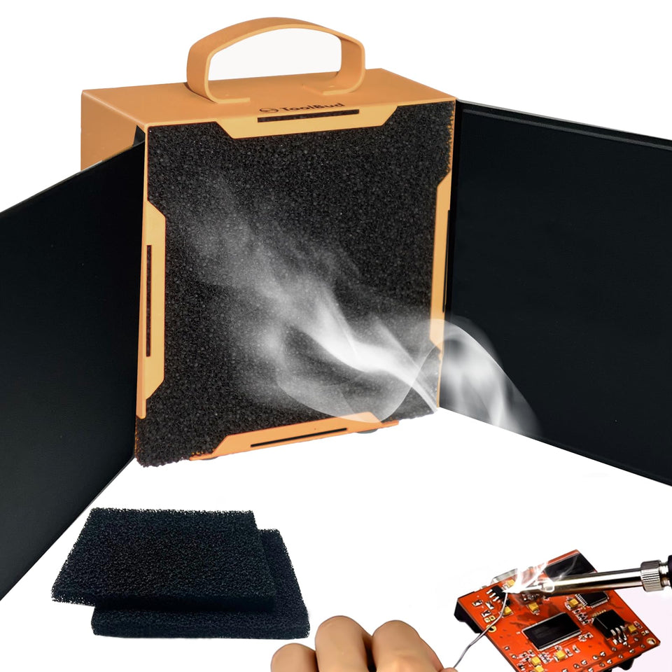 ToolBud upgraded solder fume extractor with magnetic flaps captures smoke efficiently at the desk.