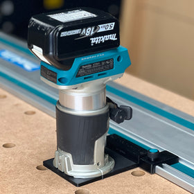 ToolCurve guide rail adapter attached to Makita setup enables precise rail alignment for clean cuts