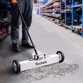 Toolwiz Magnetic Pickup Sweeper's big magnet attracts screws and nails.