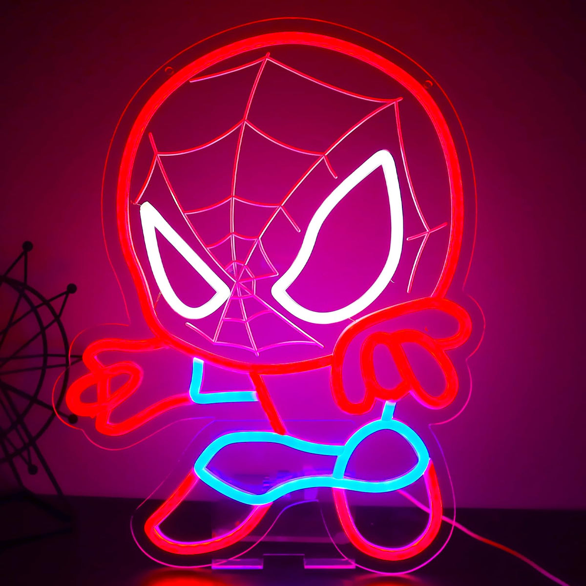 TOPQUALI Spider Neon Sign on wall creates a vibrant bedroom backdrop.
