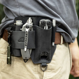 Topstache leather multitool sheath back view demonstrates belt compatibility and secure wearing.