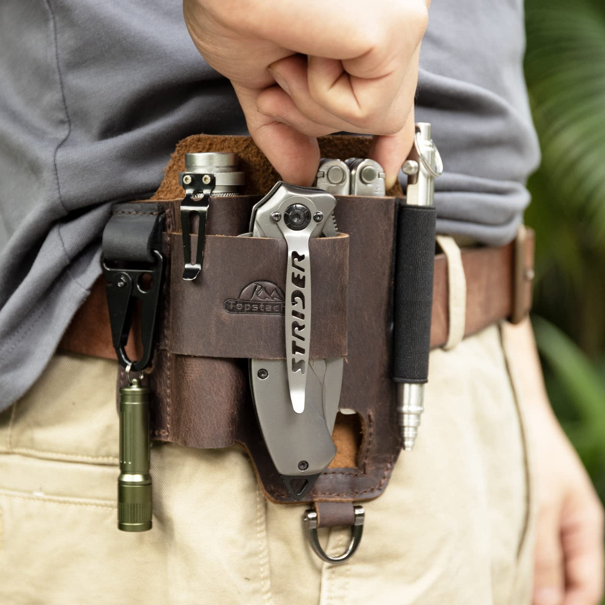 Topstache leather sheath interior with multiple compartments for tools