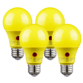 Torchstar yellow dusk-to-dawn A19 LED bulb casting warm glow at outdoor entry.