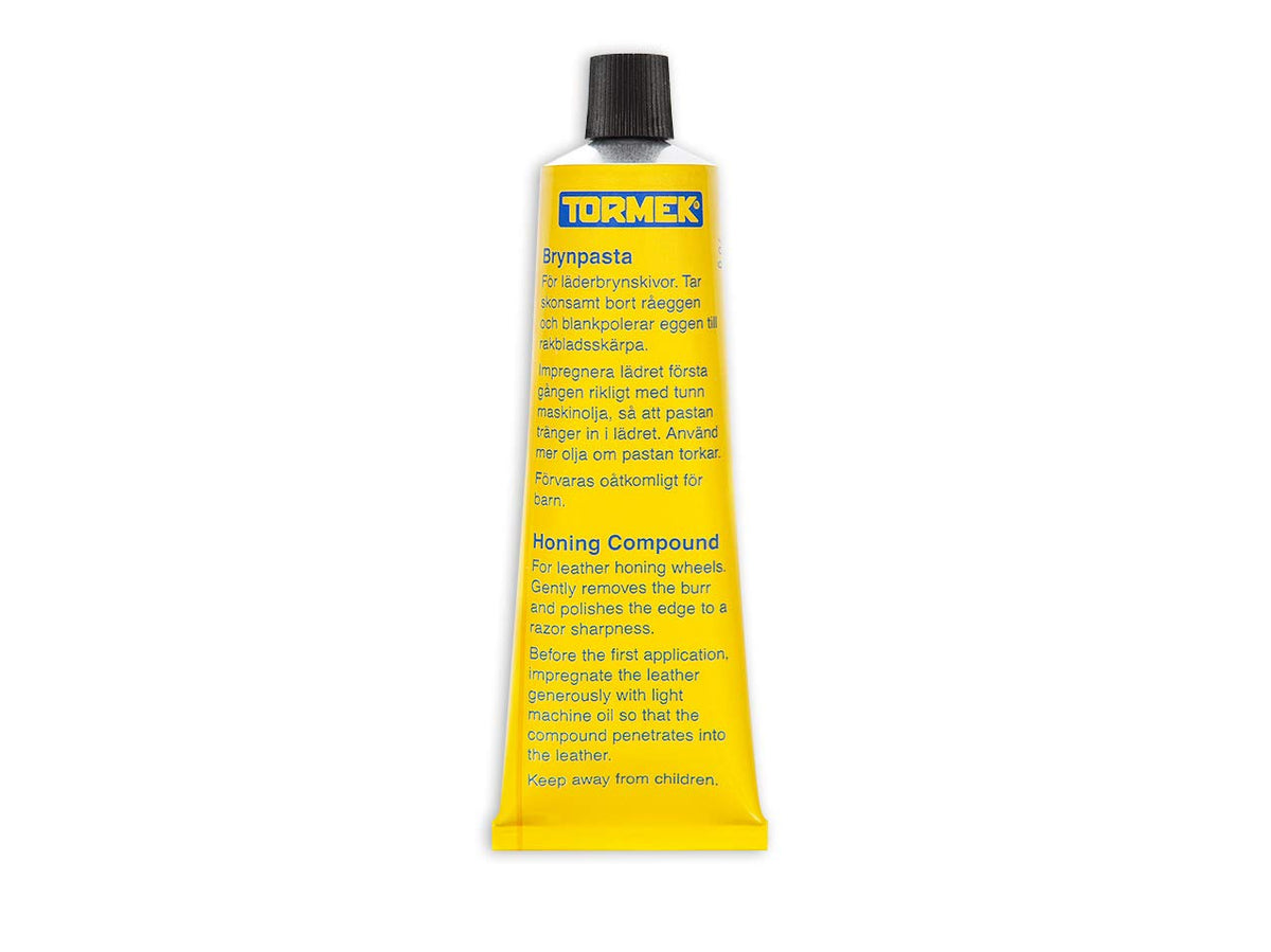 Tormek PA70 honing compound on leather wheel for burr removal and razor-sharp edges