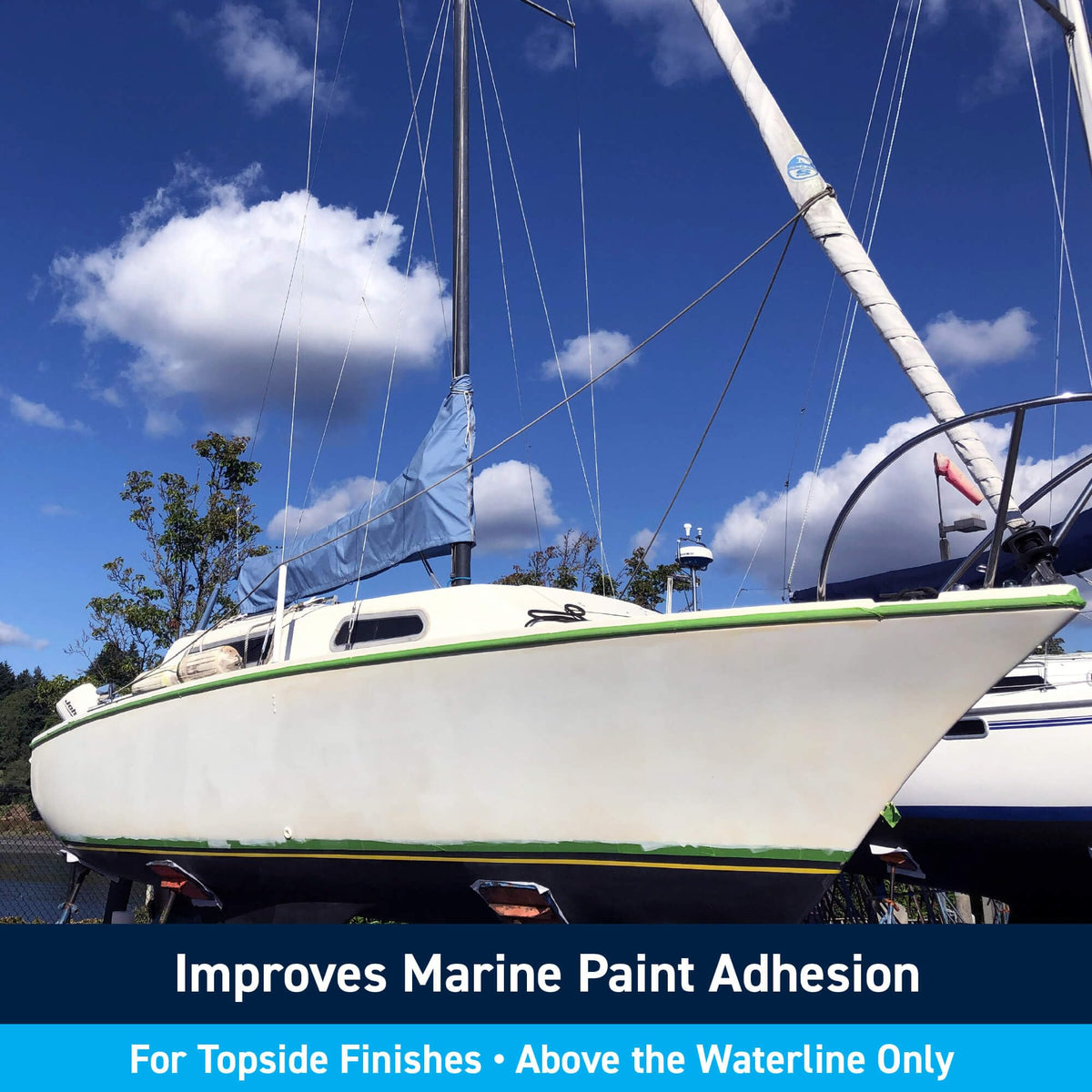 TotalBoat Topside Primer rolled on for even coverage on curved hull areas.