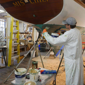 TotalBoat TotalStrip gel remover applied with a roller for easy coverage on curved surfaces.