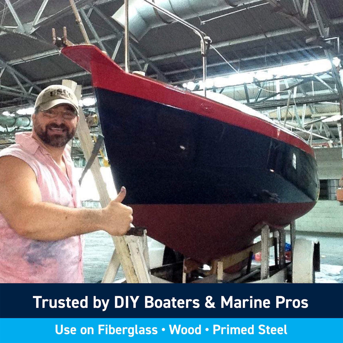 TotalBoat Underdog roller application on wood hull for even coverage.
