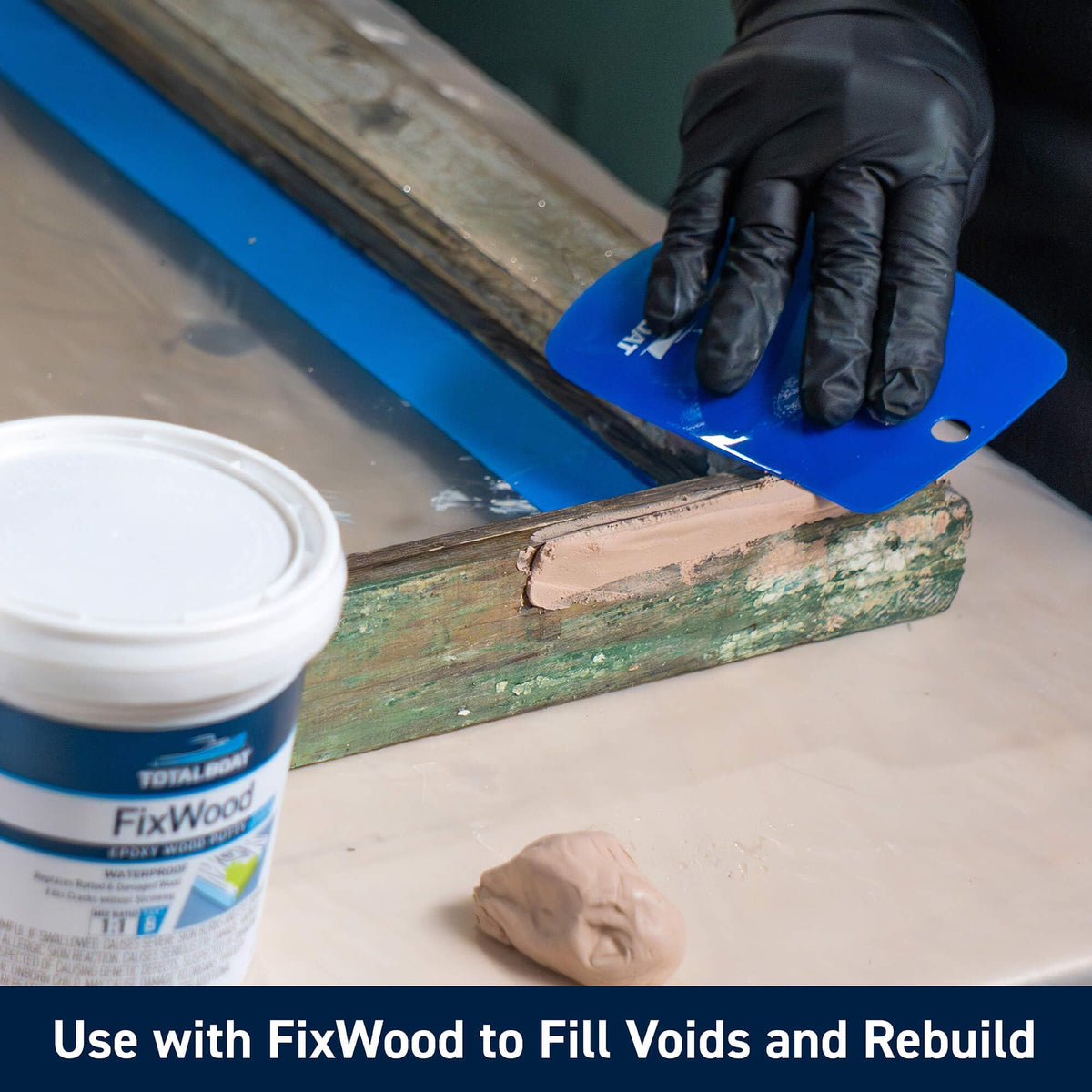 TotalBoat wood rot restoration on a boat surface using penetrating epoxy.