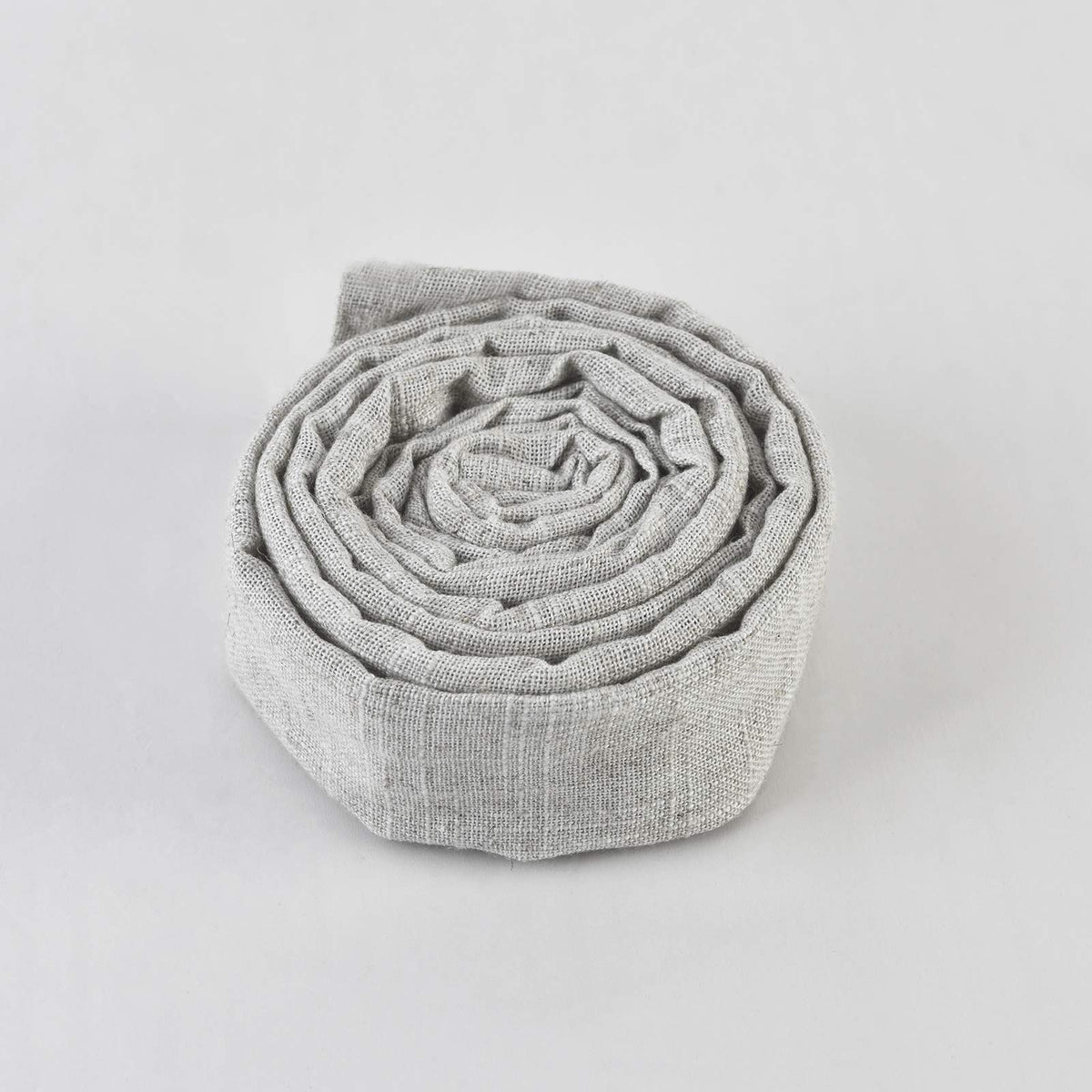 TOUERZO bleached linen detail offers subtle texture for upscale decor.