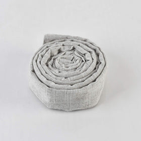 TOUERZO bleached linen detail offers subtle texture for upscale decor.