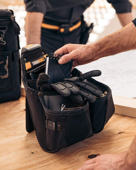 ToughBuilt ClipTech hub clips securely onto belts for fast access.
