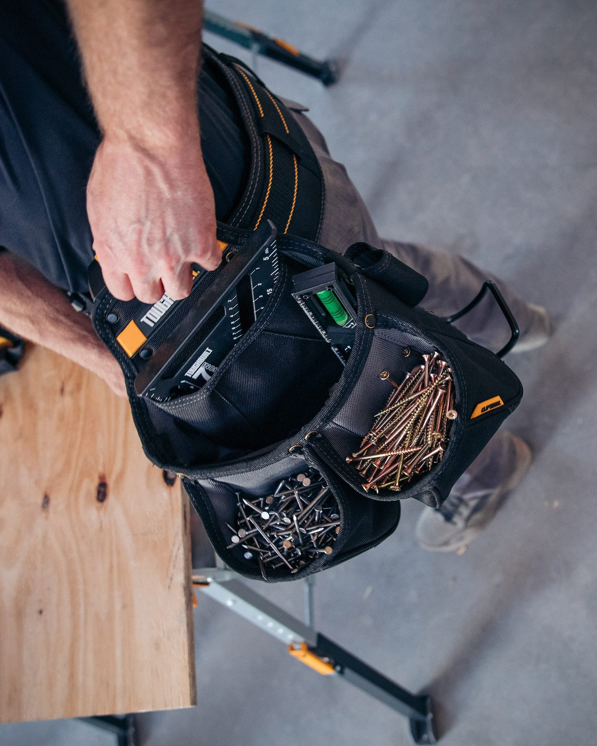 ToughBuilt ClipTech system keeps pouches secure yet easy to swap.