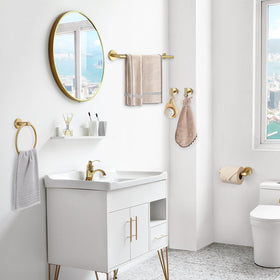Modern bathroom setup with TQKAG brushed gold accents