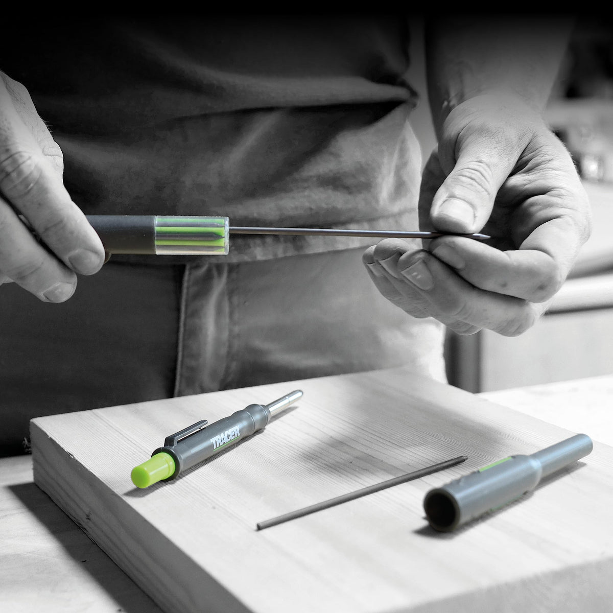 Tracer site holder with clip keeps the pencil within reach on site.
