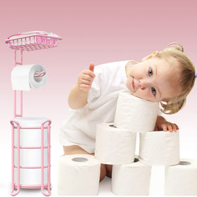 TreeLen pink freestanding toilet paper dispenser beside the toilet.