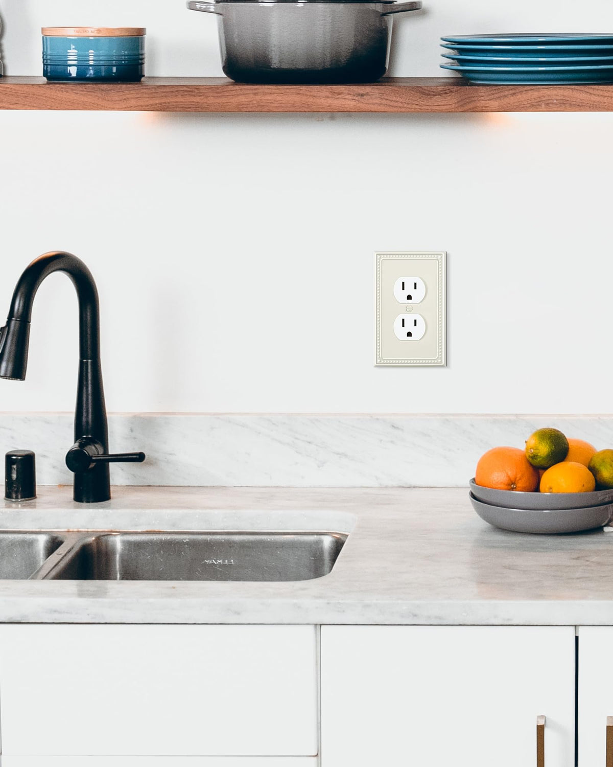 Treewell duplex cover with double switch compatibility for versatile wiring.