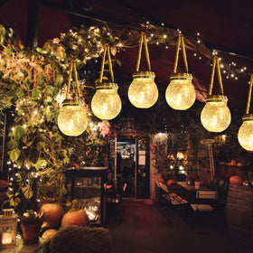 Tremdwoto bright glow at night enhances backyard charm.
