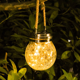 Tremdwoto crackle glass ball lantern hanging for outdoor ambiance and lawn decor.
