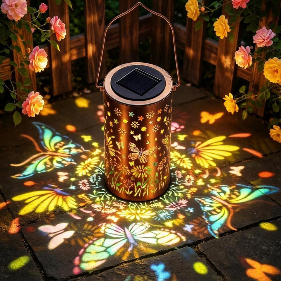 Tremdwoto solar lantern butterfly design lighting up a garden with color