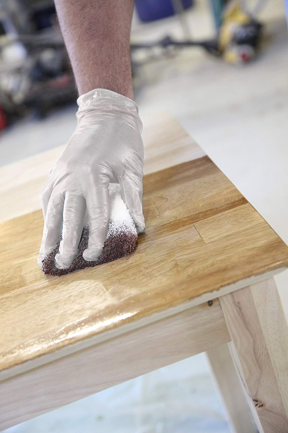 Trimaco staining pad in use with gloves for controlled staining