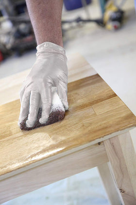 Trimaco staining pad in use with gloves for controlled staining