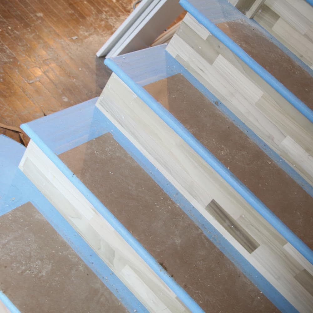 X-Paper sheets shield painted surfaces from dust and splashes.