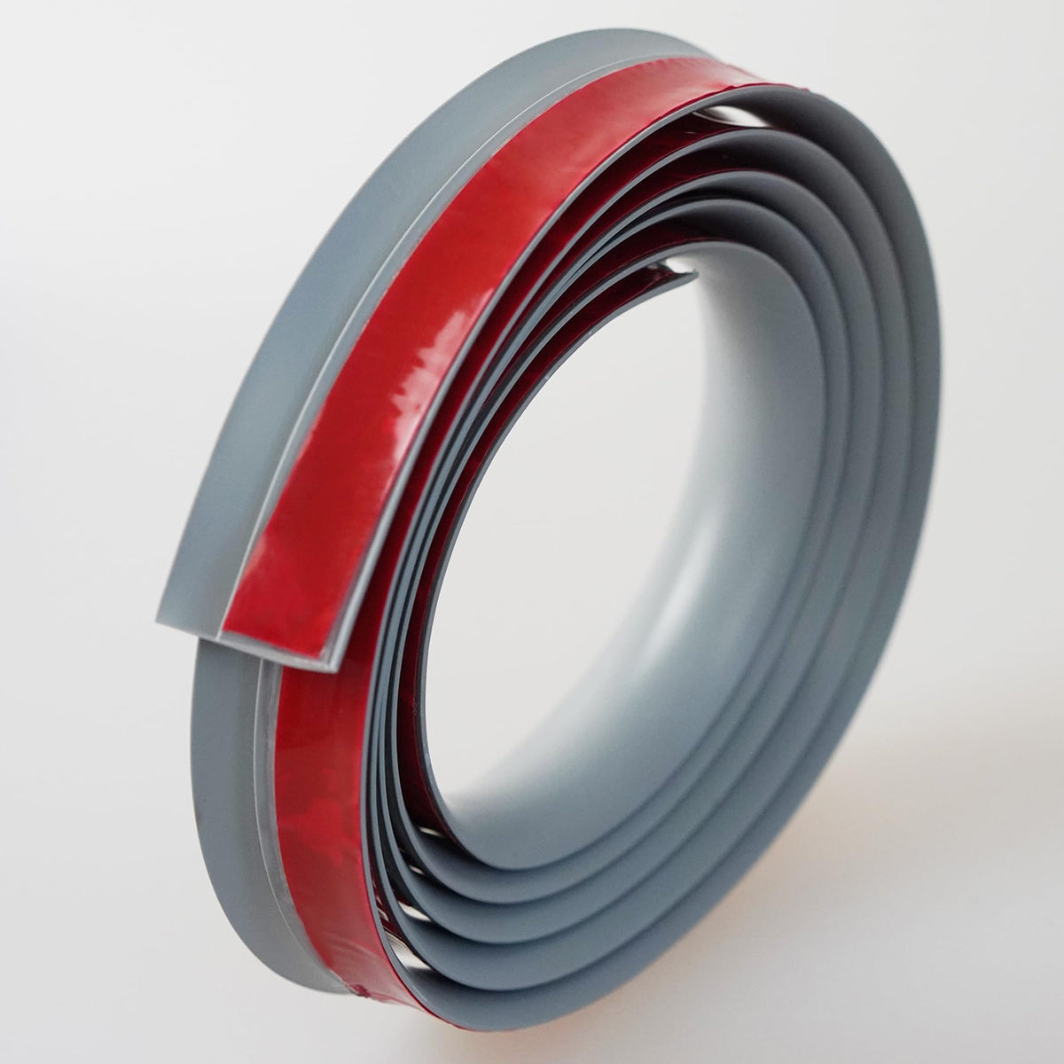 Trimold self-adhesive threshold strip demonstrates quick, tool-free setup.
