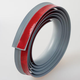 Trimold self-adhesive threshold strip demonstrates quick, tool-free setup.