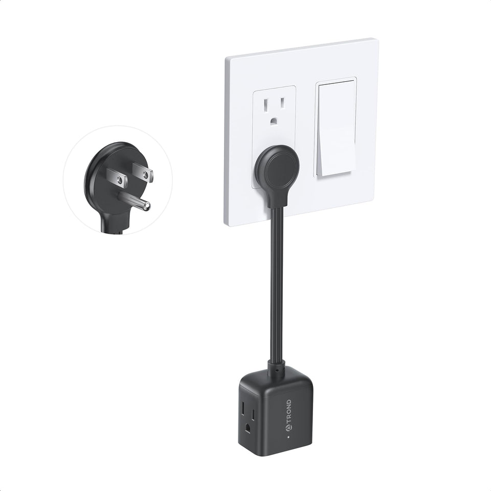 TROND flat outlet extender with a 6-inch cord in compact black design, ideal behind furniture.